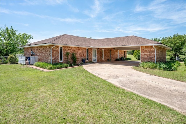 410 NW Taylor Ave, Piedmont, OK 73078 - ranch-style house with concrete driveway, a front yard, and central air condition unit