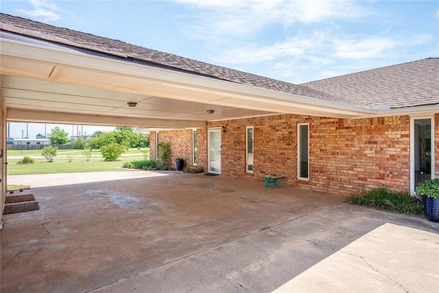 410 NW Taylor Ave, Piedmont, OK 73078 - view of patio with a carport and concrete driveway