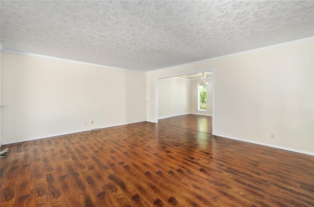 410 NW Taylor Ave, Piedmont, OK 73078 - spare room featuring wood finished floors, a textured ceiling, crown molding, and baseboards