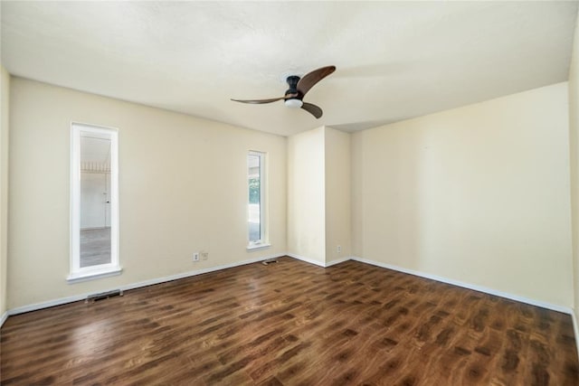 410 NW Taylor Ave, Piedmont, OK 73078 - empty room with dark wood-type flooring, baseboards, and ceiling fan