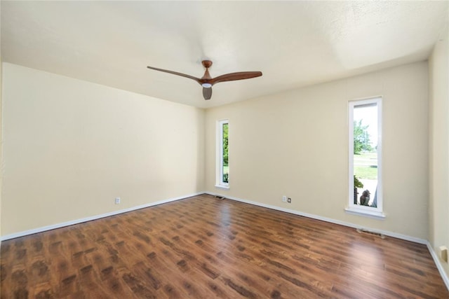 410 NW Taylor Ave, Piedmont, OK 73078 - empty room with wood finished floors, baseboards, and a ceiling fan