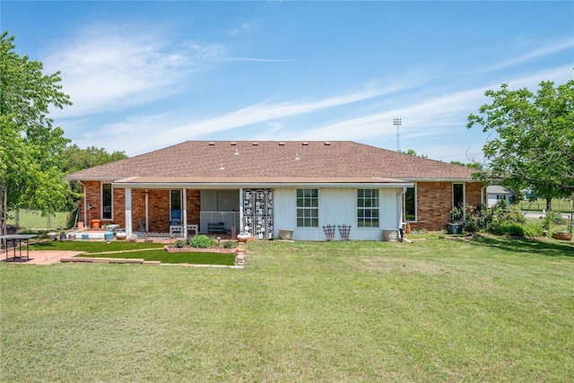 410 NW Taylor Ave, Piedmont, OK 73078 - rear view of house with a yard, a patio, brick siding, and roof with shingles