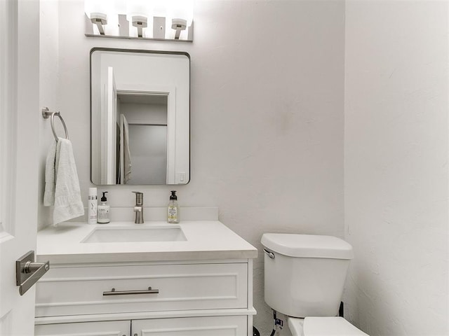 6001 Broadmoor Ave, Oklahoma City, OK 73132 - bathroom with toilet and vanity