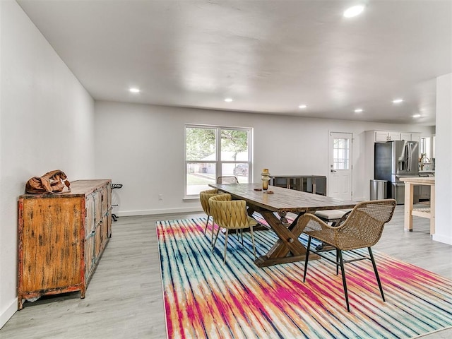 6001 Broadmoor Ave, Oklahoma City, OK 73132 - dining space with plenty of natural light, light wood-style flooring, recessed lighting, and baseboards