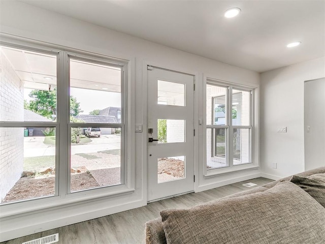 6001 Broadmoor Ave, Oklahoma City, OK 73132 - entryway featuring plenty of natural light, wood finished floors, recessed lighting, and baseboards