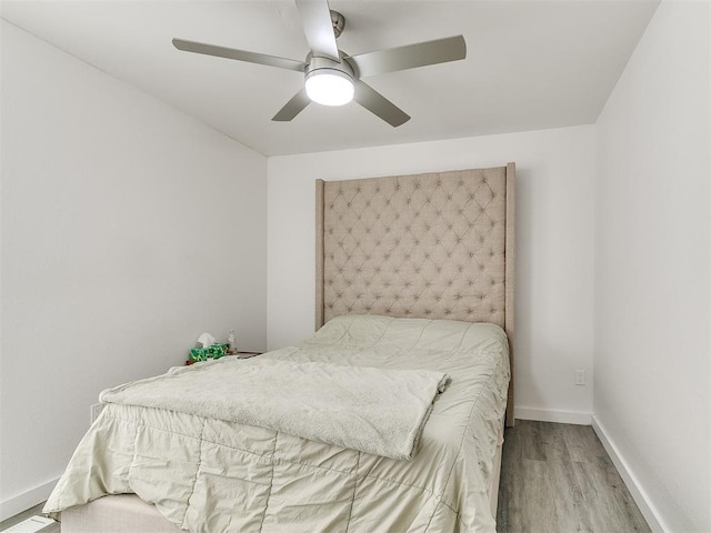 6001 Broadmoor Ave, Oklahoma City, OK 73132 - bedroom with wood finished floors, baseboards, and ceiling fan