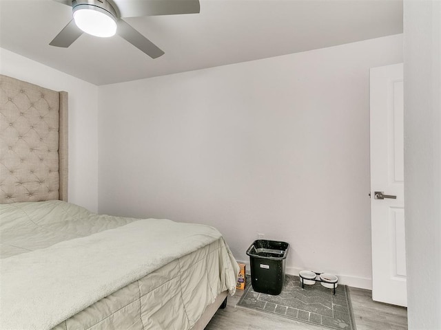 6001 Broadmoor Ave, Oklahoma City, OK 73132 - bedroom with wood finished floors and ceiling fan
