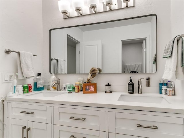 6001 Broadmoor Ave, Oklahoma City, OK 73132 - full bathroom featuring double vanity
