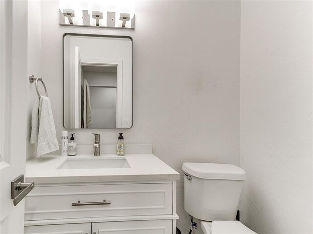 6001 Broadmoor Ave, Oklahoma City, OK 73132 - half bath with toilet and vanity
