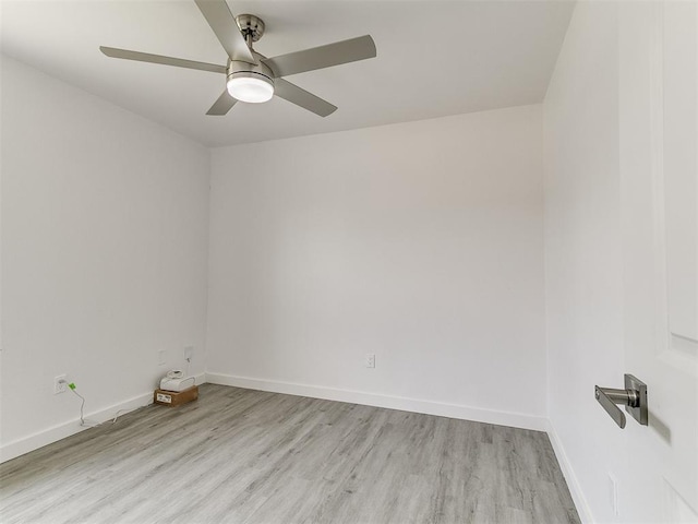 6001 Broadmoor Ave, Oklahoma City, OK 73132 - empty room with a ceiling fan and light wood-style flooring