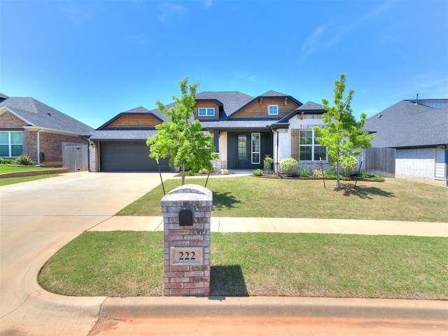 222 Alamosa Rd, Norman, OK 73069 - craftsman-style home with concrete driveway and an attached garage