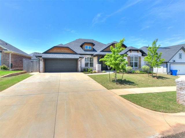 222 Alamosa Rd, Norman, OK 73069 - craftsman-style house featuring a garage, concrete driveway, and roof with shingles