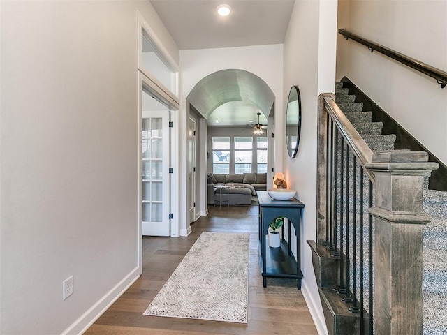 222 Alamosa Rd, Norman, OK 73069 - entryway featuring ceiling fan, wood finished floors, arched walkways, and baseboards