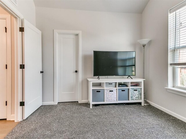 222 Alamosa Rd, Norman, OK 73069 - living area featuring carpet flooring and baseboards