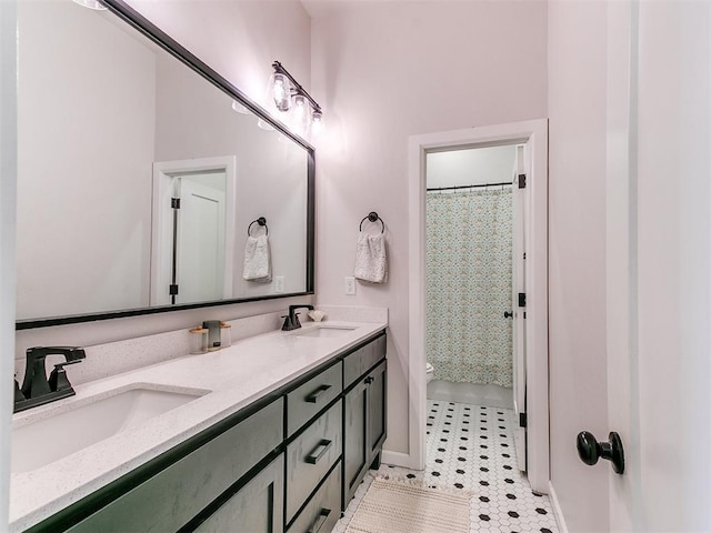 222 Alamosa Rd, Norman, OK 73069 - bathroom featuring toilet, double vanity, curtained shower, and tile patterned flooring