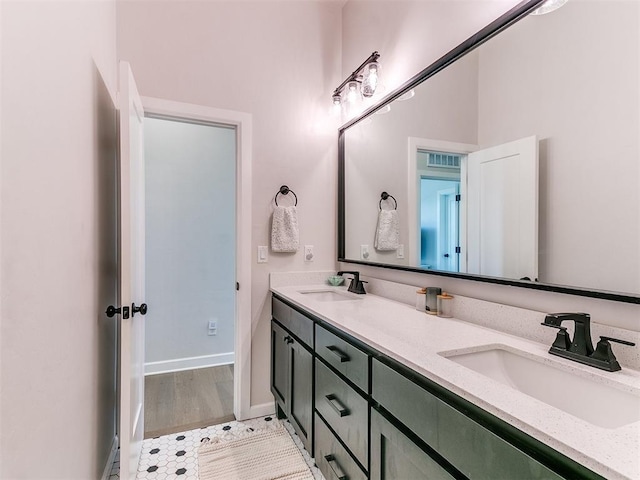222 Alamosa Rd, Norman, OK 73069 - full bath with double vanity and baseboards
