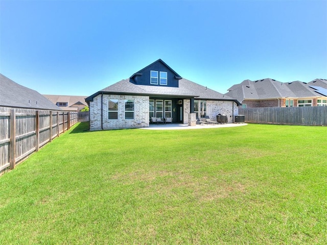 222 Alamosa Rd, Norman, OK 73069 - rear view of property featuring a patio, central AC, and brick siding