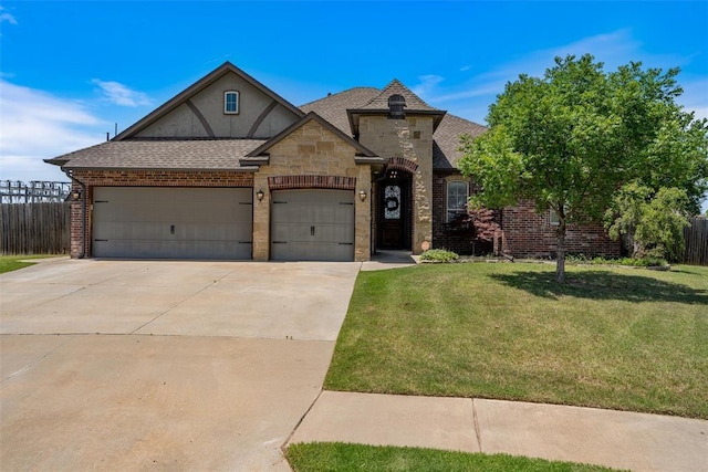 1609 SW 123rd St, Oklahoma City, OK 73170 - view of front of property featuring a garage, driveway, stone siding, and a shingled roof