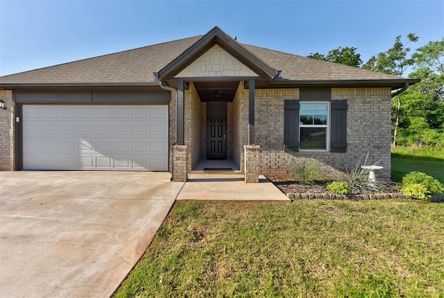 9749 Livingston Rd, Edmond, OK 73025 - view of front of house with concrete driveway, a garage, a front yard, and brick siding