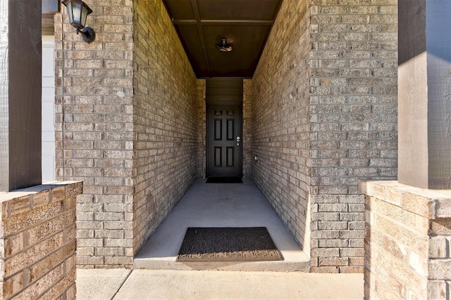9749 Livingston Rd, Edmond, OK 73025 - property entrance featuring brick siding
