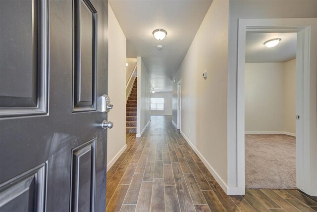 9749 Livingston Rd, Edmond, OK 73025 - hallway featuring dark wood finished floors and baseboards
