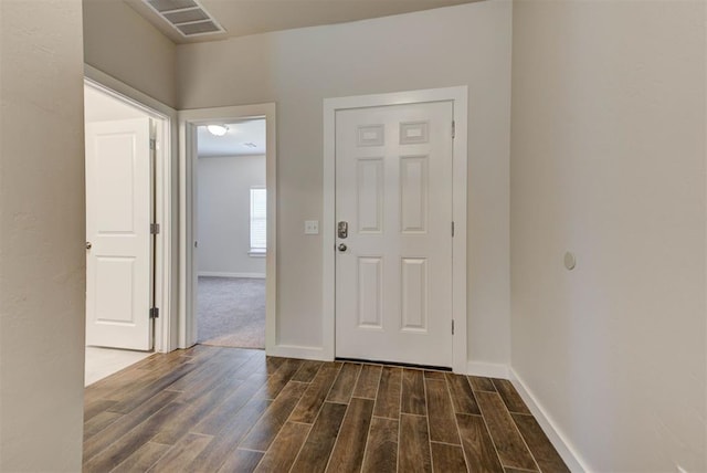 9749 Livingston Rd, Edmond, OK 73025 - foyer with wood finished floors and baseboards