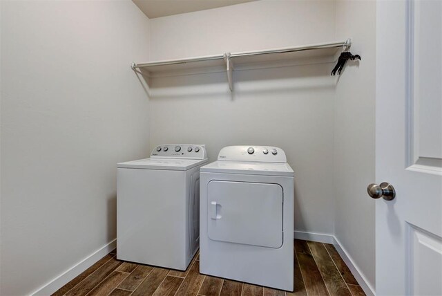 9749 Livingston Rd, Edmond, OK 73025 - washroom featuring independent washer and dryer, dark wood finished floors, and baseboards