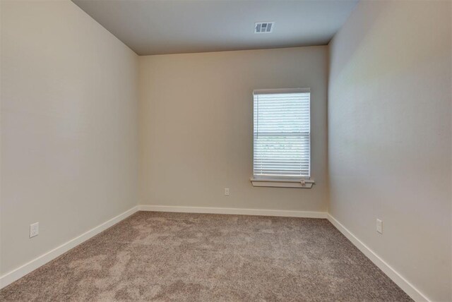 9749 Livingston Rd, Edmond, OK 73025 - empty room featuring carpet and baseboards