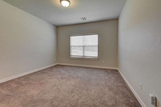 9749 Livingston Rd, Edmond, OK 73025 - empty room featuring carpet flooring and baseboards