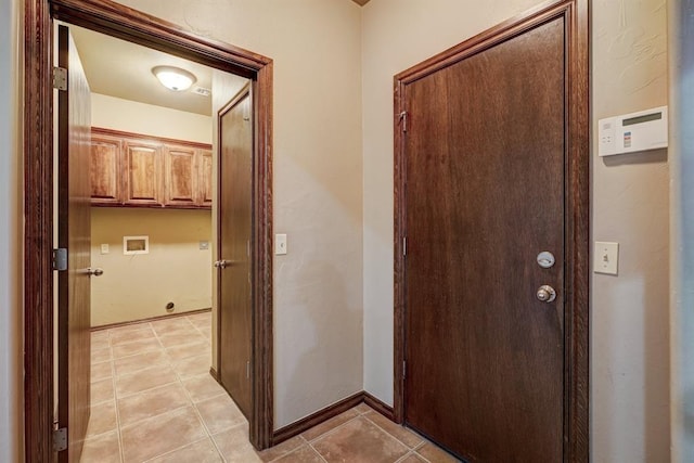 924 Regal Rd, Yukon, OK 73099 - hall with light tile patterned floors and baseboards