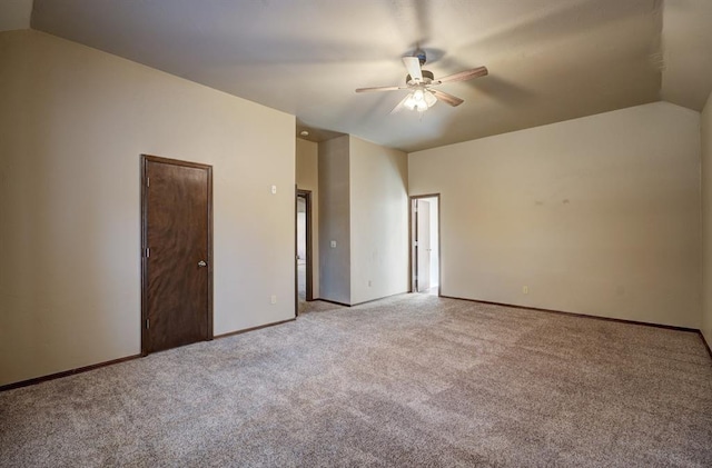 924 Regal Rd, Yukon, OK 73099 - unfurnished bedroom featuring light carpet, vaulted ceiling, baseboards, and ceiling fan