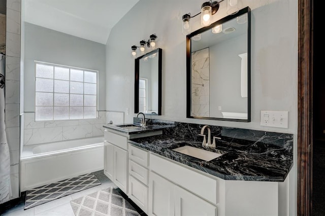 924 Regal Rd, Yukon, OK 73099 - full bath featuring double vanity, a bathtub, tile patterned flooring, and vaulted ceiling