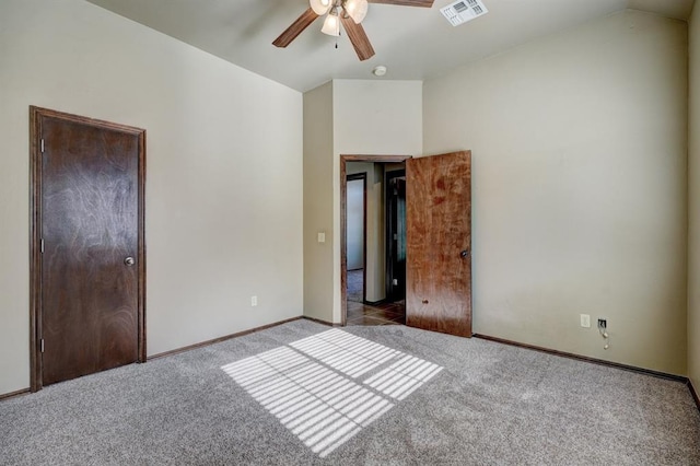 924 Regal Rd, Yukon, OK 73099 - unfurnished bedroom featuring carpet, baseboards, a ceiling fan, and lofted ceiling