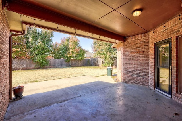 924 Regal Rd, Yukon, OK 73099 - fenced backyard with a patio area