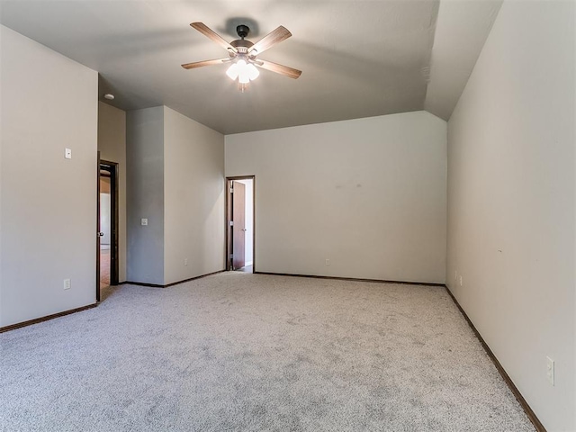924 Regal Rd, Yukon, OK 73099 - carpeted spare room featuring a ceiling fan, baseboards, and lofted ceiling