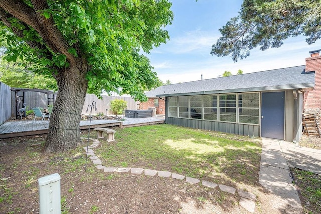 view of yard featuring a wooden deck