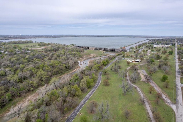 aerial view of property's location featuring a nearby body of water