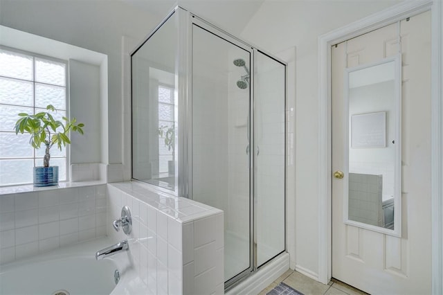 12308 Hickory Creek Blvd, Oklahoma City, OK 73170 - full bathroom featuring a stall shower, a bath, and tile patterned floors