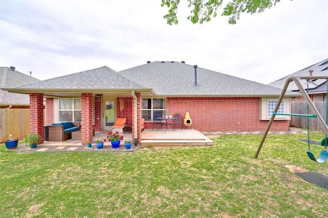 12308 Hickory Creek Blvd, Oklahoma City, OK 73170 - back of property with outdoor lounge area, brick siding, and a shingled roof