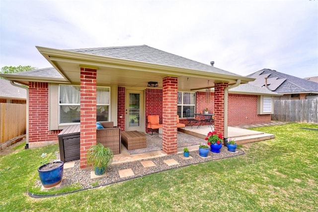 12308 Hickory Creek Blvd, Oklahoma City, OK 73170 - view of front of property with brick siding, a shingled roof, and a patio