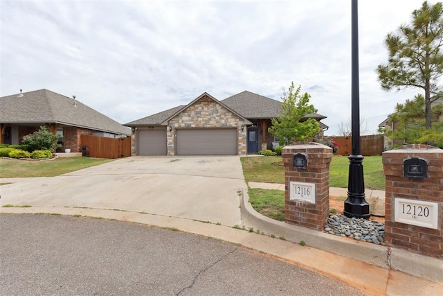 12116 NW 137th St, Piedmont, OK 73078 - view of front facade with an attached garage, driveway, a shingled roof, and stone siding