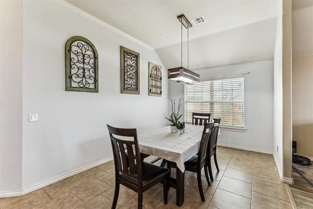 12116 NW 137th St, Piedmont, OK 73078 - dining space with light tile patterned floors, vaulted ceiling, baseboards, and ornamental molding