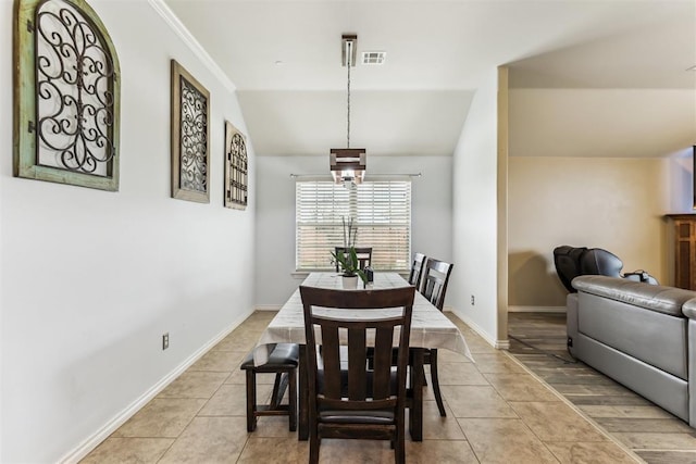 12116 NW 137th St, Piedmont, OK 73078 - dining room with light tile patterned flooring, baseboards, and vaulted ceiling