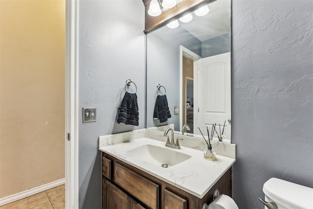12116 NW 137th St, Piedmont, OK 73078 - bathroom with toilet, tile patterned flooring, vanity, and a textured wall