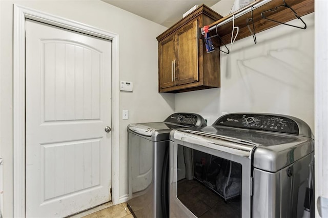 12116 NW 137th St, Piedmont, OK 73078 - laundry room featuring washer and clothes dryer and cabinet space