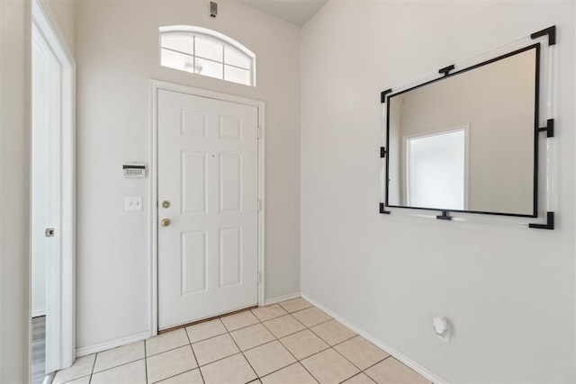 2013 Cedar Meadow Ln, Edmond, OK 73003 - entryway with baseboards and light tile patterned floors