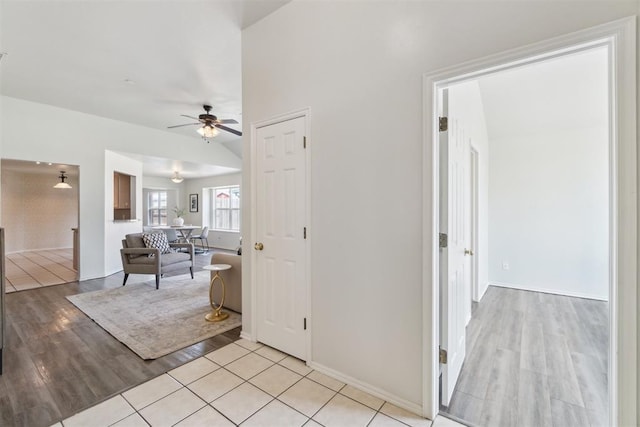 2013 Cedar Meadow Ln, Edmond, OK 73003 - corridor featuring light wood finished floors and baseboards