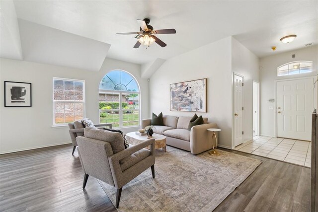 2013 Cedar Meadow Ln, Edmond, OK 73003 - living room featuring a ceiling fan, lofted ceiling, wood finished floors, and baseboards