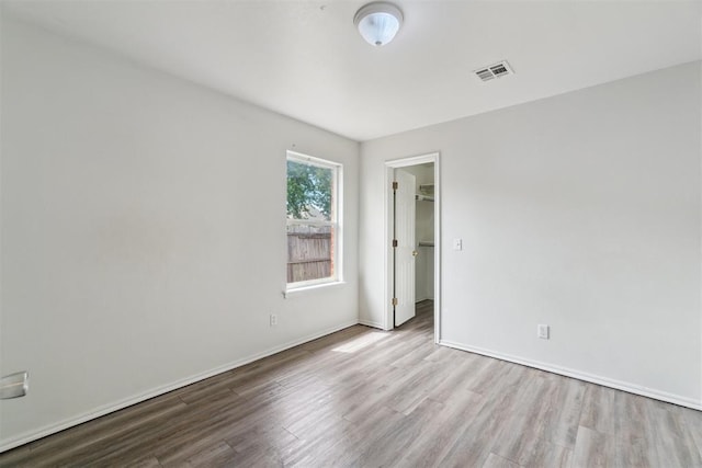 2013 Cedar Meadow Ln, Edmond, OK 73003 - empty room featuring wood finished floors and baseboards