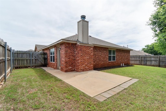 2013 Cedar Meadow Ln, Edmond, OK 73003 - back of house with brick siding, a patio, and a chimney